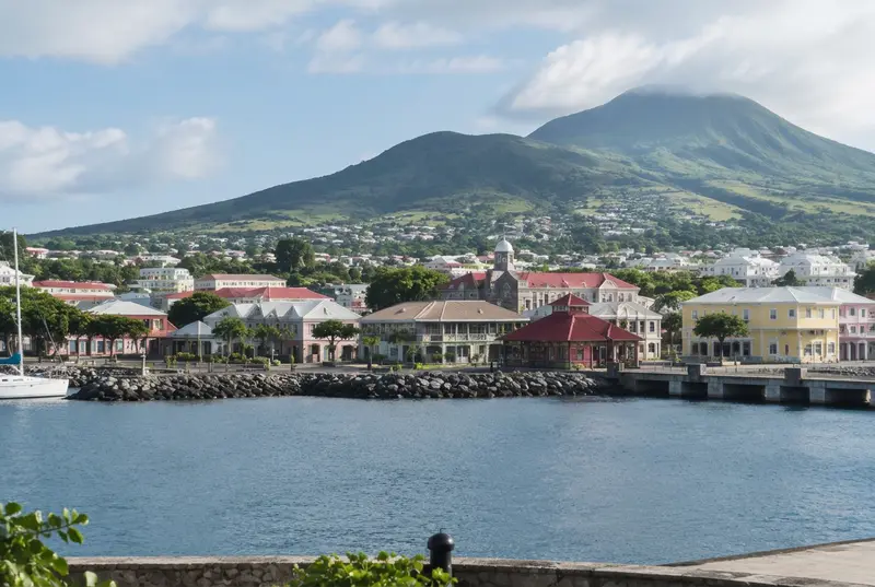 St Kitts waterfront beneath green hills